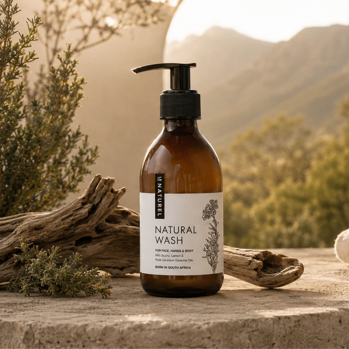 Le Naturel Natural Wash bottle in a South African fynbos landscape